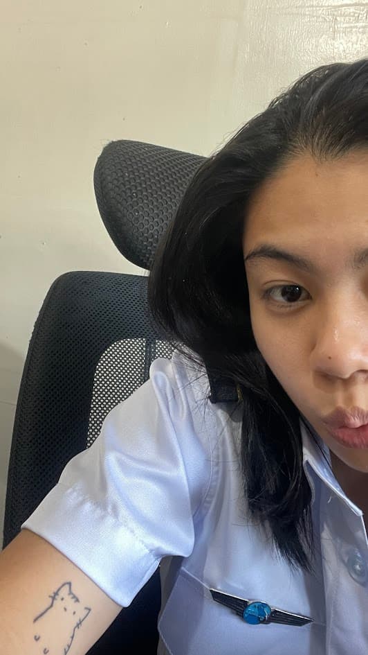 April in uniform at her registrar job